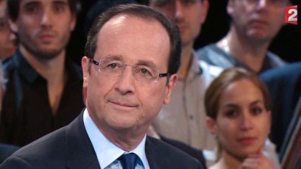 Francois Hollande ... more money promised for schools.
