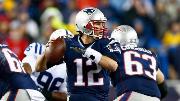 Deflated ball ... Quarterback Tom Brady of the New England Patriots looks to pass against the Indianapolis Colts.