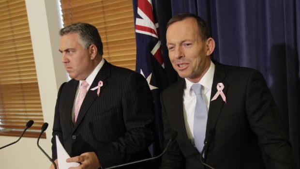 Tony Abbott and Joe Hockey respond to the budget update at Parliament House in Canberra.