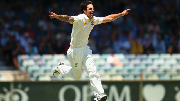 Stoked: Mitchell Johnson celebrates a wicket in the  Perth Test.
