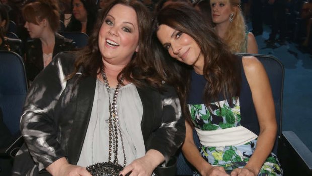 Actors Melissa McCarthy (L) and Sandra Bullock  a winning duo at the People's Choice Awards in LA.
