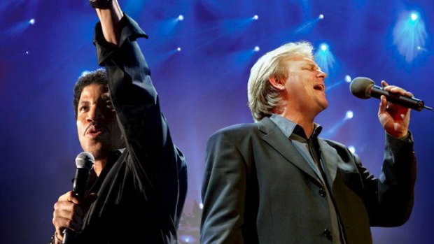 Lionel Richie and John Farnham "charmed the pants off" Rod Laver Arena.