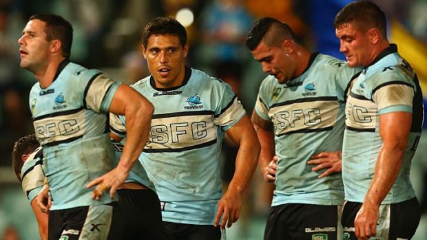 Sharks players look dejected after losing to the Parramatta Eels.