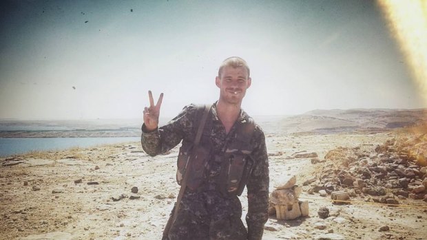 Robert Somerville in battle fatigues in Syria.