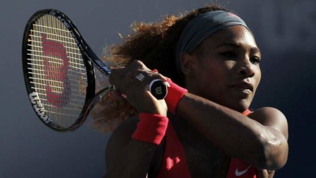 Power hitter: Serena Williams hits a return to Li Na of China at the U.S. Open tennis championships in New York.