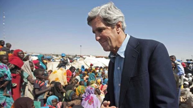 US Senator John Kerry visits a refugee camp in Darfur.