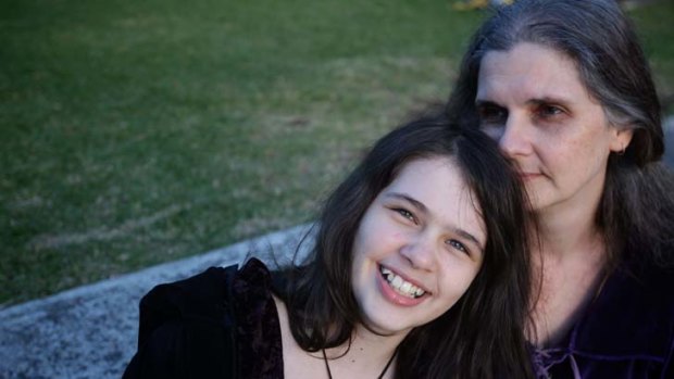 Grateful ... Megan Hitchens with her daughter Jessica, 12, who attended Wyong Public School, which faces funding cuts.