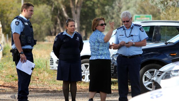 Federal MP Sopie Mirabella, who lives on a neighbouring property, speaks to police.