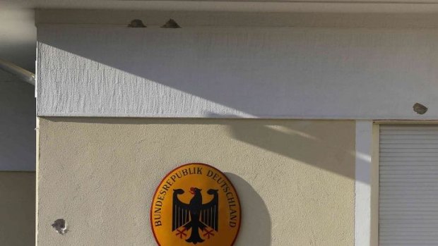 Bullet holes on the wall of German Ambassador Wolfgang Dold's Athens residence. Unknown gunmen sprayed the building with up to 60 bullets.