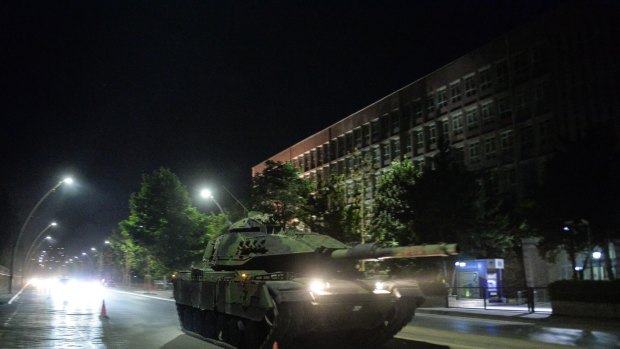 Turkish army tanks move in the main streets of Ankara in the early hours of Saturday.