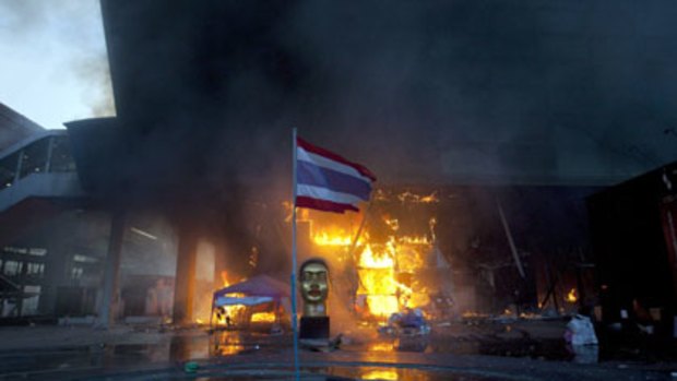 Bangkok's Central World shopping mall burns after yesterday's violence.