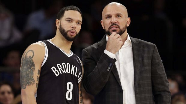 Brooklyn Nets coach Jason Kidd talks with Deron Williams at Madison Square Garden.