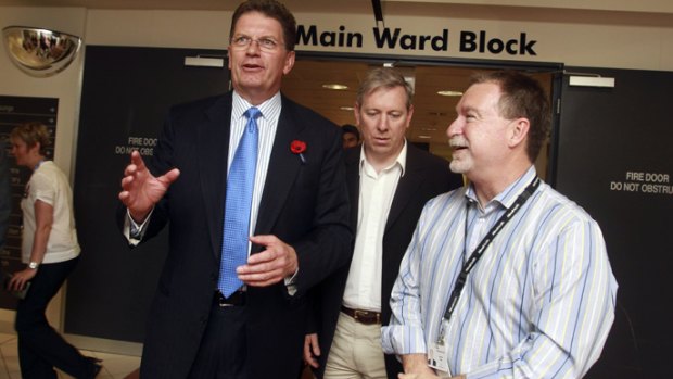 Alfred Hospital CEO Andrew Way, right, pictured with Premier Ted Baillieu and David David, has been recalled to parliament.