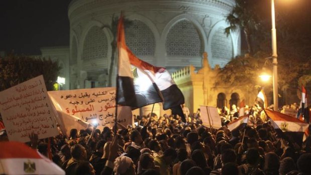 Protesters chant anti-Morsi slogans in front of the presidential palace in Cairo after Egypt’s opposition called for mass protests against the government on Tuesday.