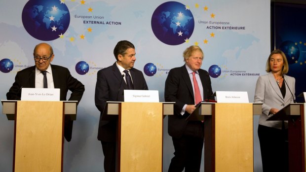United front?: From left, French Foreign Minister Jean-Yves Le Drian, German Foreign Minister Sigmar Gabriel, British Foreign Secretary Boris Johnson and European Union foreign policy chief Federica Mogherini after a meeting of the EU3 and Iran  in Brussels on January 11.  