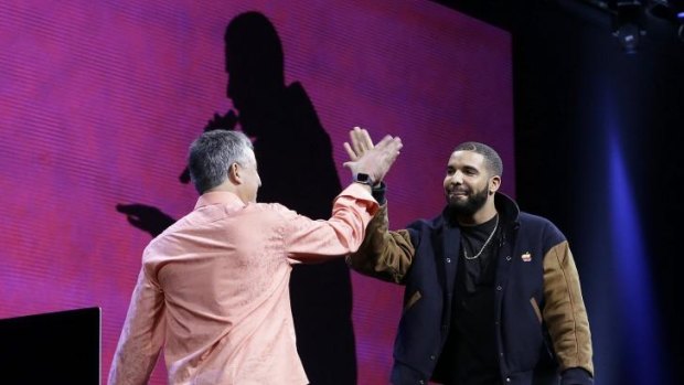 Drake, right, who will host a show, with Eddy Cue, an Apple executive, at the Apple Music introduction.