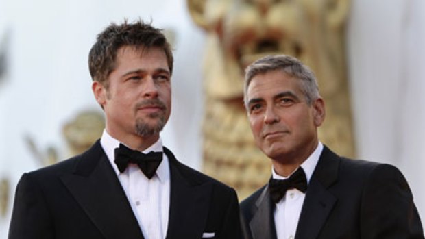 Won't be silenced ... Brad Pitt and George Clooney.