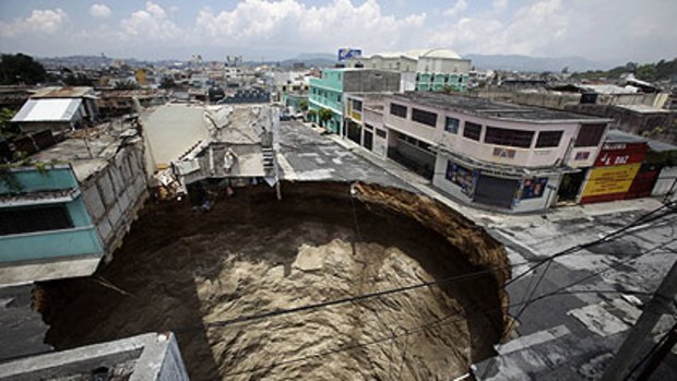The city's latest sinkhole ... 30 metres deep.