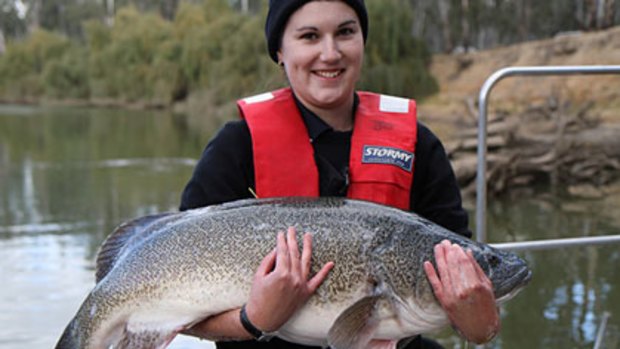 Joanne Kearns, DSE Fish Ecologist, shows off her latest "catch".