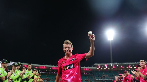 Farewell to arms: Brett Lee is given a guard of honour as he walks from the field for the last time at the SCG following the Big Bash League match between the Sydney Sixers and the Sydney Thunder.