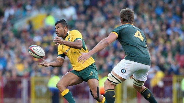 Costly bill: Kurtley Beale takes on the Springboks in Cape Town after Di Patston had allegedly confronted him on the sideline about a hotel bill.