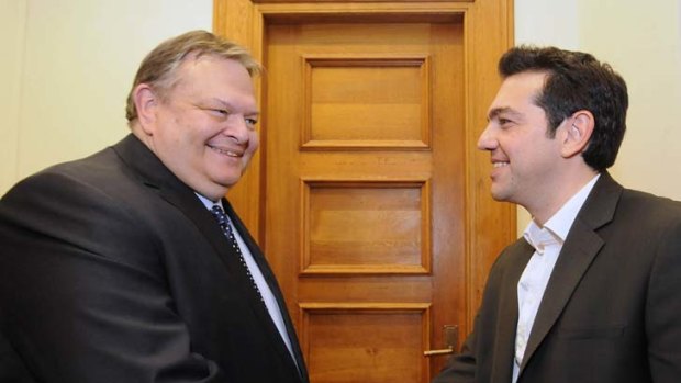 Next up &#8230; Socialist leader Evangelos Venizelos, left, faces the task of forming a government after Alexis Tsipras admitted defeat.