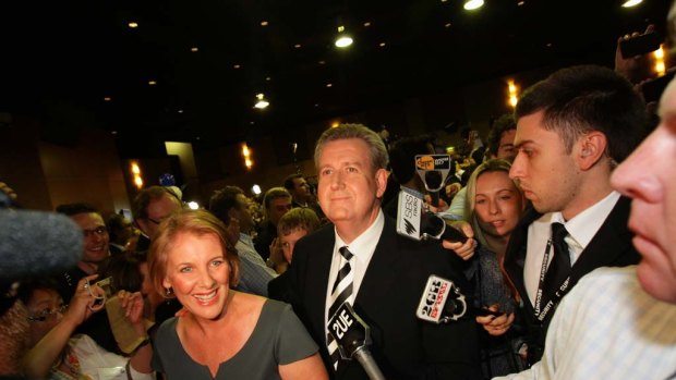 Barry O'Farrell takes his first steps, with his wife Rosemary, as Premier of NSW.