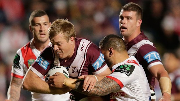 Moral fibre: Manly skipper Jake Trbojevic (centre) was awarded strange praise by team coach Trent Barrett.