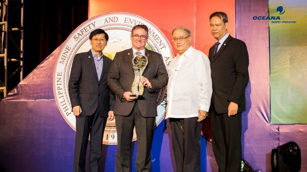 OceanaGold chief executive Mick Wilkes is presented with the Presidential PMIEA award in November 2016 at a ceremony held in the Philippines.