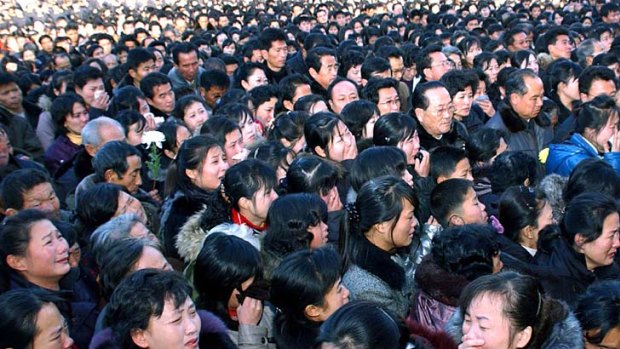 People mourn the death of the North Korean leader Kim Jong-Il.