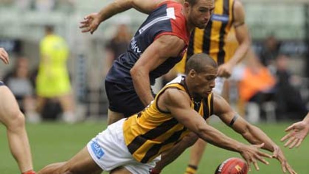 So over it ...  Hawthorn recruit Josh Gibson is right on top of possession as his side dominated in yesterday’s convincing first-round win against Melbourne at the MCG.