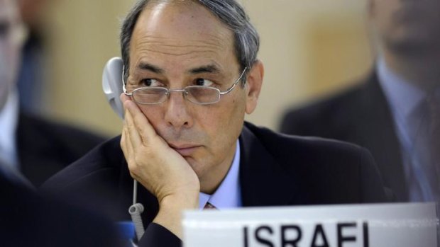 Israel's Ambassador to the UN, Eviatar Manor, listens to a statement at the United Nations Human Rights Council at the UN headquarters in Geneva.