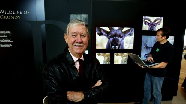 Reg Grundy pictured in front of some of his wildlife photography at the NSW Art Gallery in 2005. 