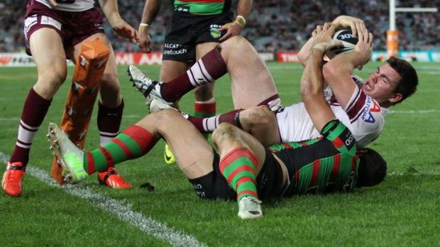Centre stage: Centres have arguably  become as important as the traditional 'spine' positions - and there have been none better than Manly's Jamie Lyon.
