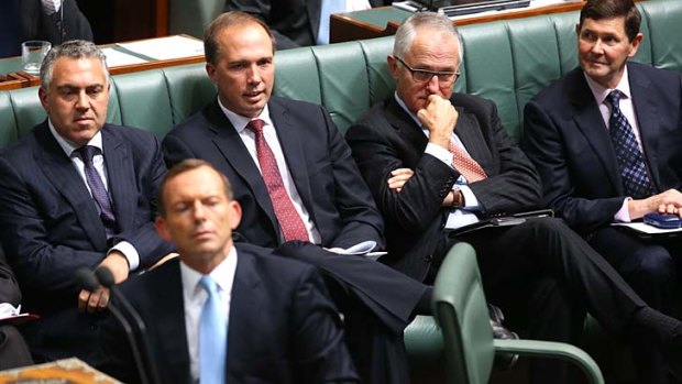 Not happy little vegemites: Tony Abbott and some of his frontbench.