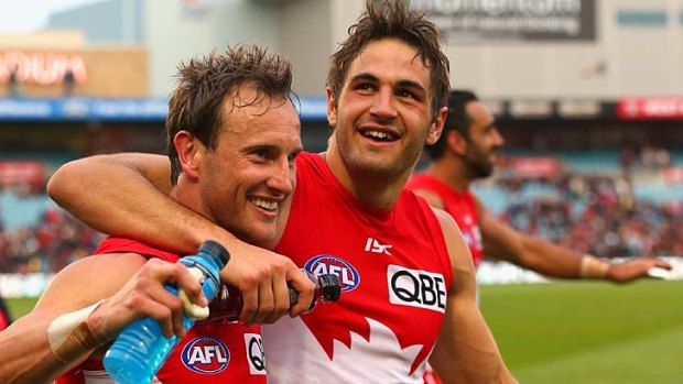Game in his veins ... Josh Kennedy, right, and his Swans mentor Jude Bolton after the qualifying final win over the crows.