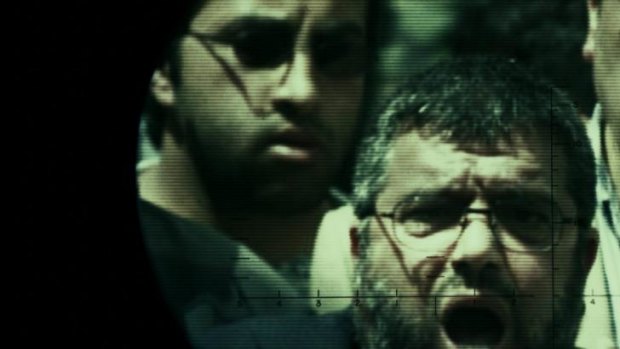 Behind the wire: Mosab Hassan Yousef (left) and his father Sheikh Hassan Yousef, one of the founders of Hamas.