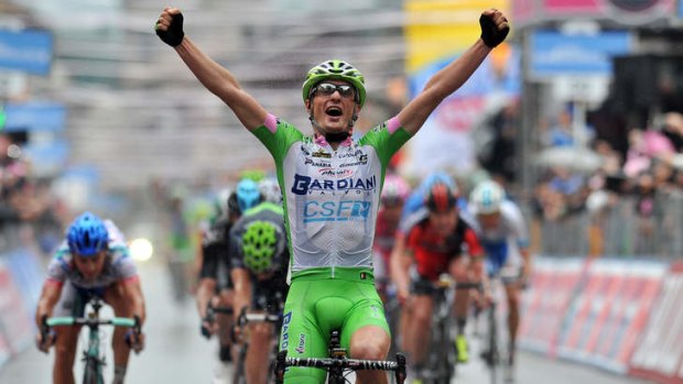 Enrico Battaglin of Italy crosses the finish line to win the fourth stage of the Giro d'Italia, from Policastro Bussentino to Serra San Bruno.