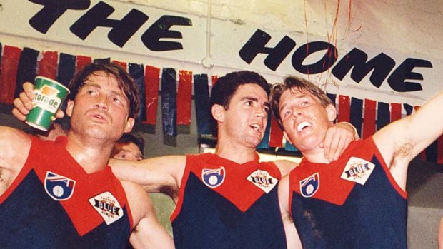 Golden days: Melbourne captain Garry Lyon delebrates with David Schwarz and Todd Viney, left, after a finals win over Carlton at the MCG, 1994.
