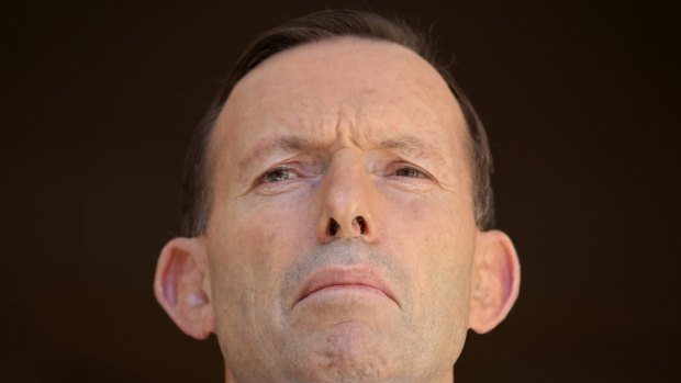 Incredulous: Prime Minister Tony Abbott has ordered an inquiry into the Martin Place siege as more details have emerged regarding the gunman's background.
