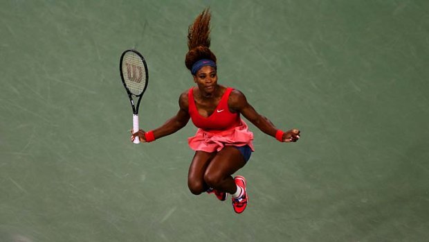 One of the greats: Serena Williams celebrates beating Victoria Azarenka in the US Open final.