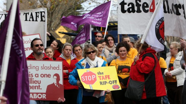 Protesters against cuts to TAFE take action outside Denis Napthine's Warrnambool office.