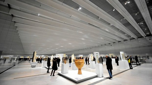 People visit the Louvre Museum on the first day of its opening to the public.