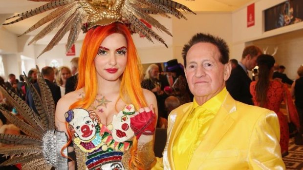 The happy couple: Gabi Grecko shows off her engagement ring with Geoffrey Edelsten.