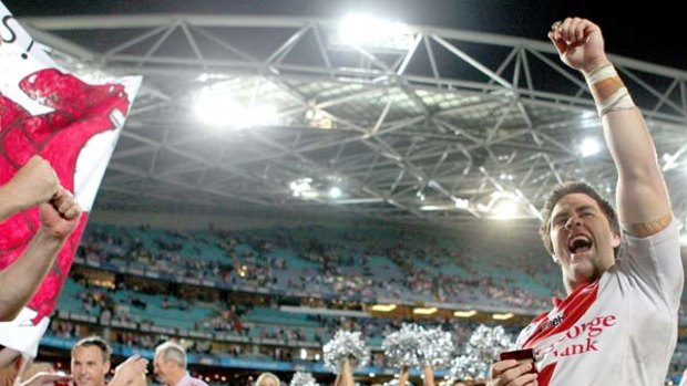 V is for victory . . . Jamie Soward celebrates with the crowd.