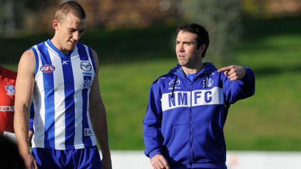 Rooing to go: Drew Petrie with coach Brad Scott.