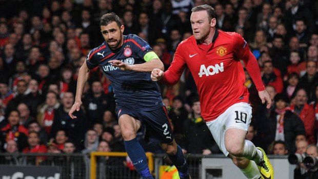 Motivated: Rooney in action for Man United in the Champions League