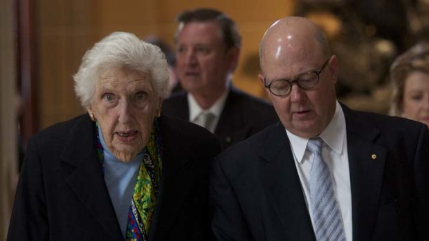 Farewell ... Margaret Whitlam with son-in-law Kim Williams, now the News Limited chief executive, at the funeral of her friend, Margaret Olley, last August.