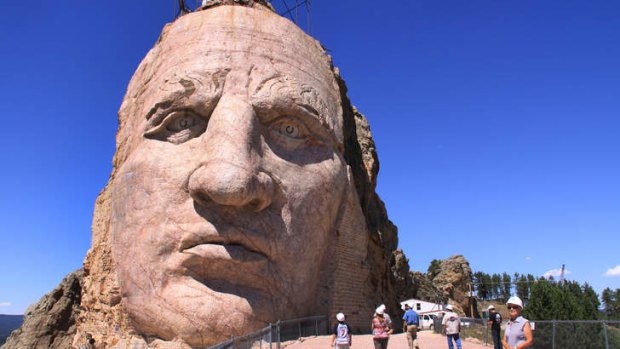 Carve up: Chief Crazy Horse in South Dakota attracts a million visitors a year.