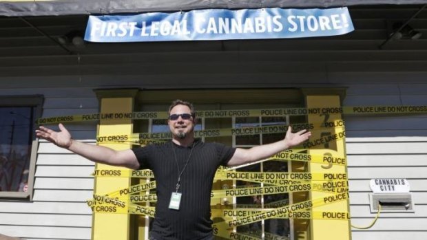 Cannabis City owner James Lathrop at the "ceremonial" opening of his store, one of the first allowed to sell cannabis for recreational use in Washington state.